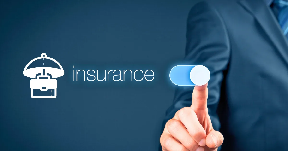 A person in a suit presses a digital toggle switch next to the word “business insurance” and an icon of an umbrella over a briefcase, symbolizing activating business insurance services.