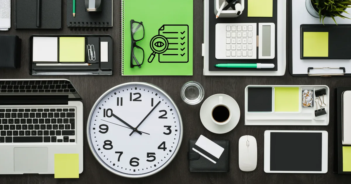 A desk with organized office supplies, perfect for a productivity audit, including a laptop, notebooks, wall clock, glasses, coffee cup, calculator, pen, sticky notes, tablet, and mouse—all arranged neatly in a flat lay style.