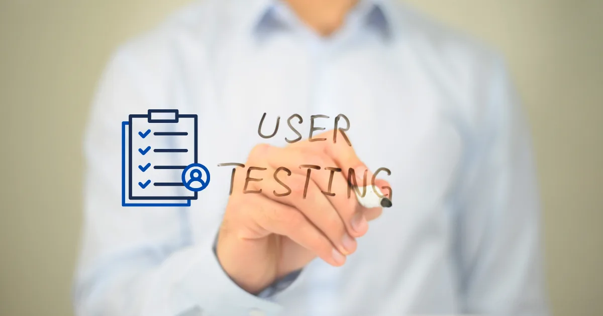 A person in a light blue shirt writes USER TESTING on a transparent board, highlighting user testing as a side hustle. Next to the text is an icon of a checklist with a magnifying glass. The background is blurred.