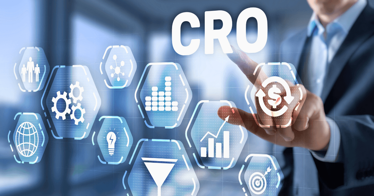 A person touches a virtual screen displaying the acronym CRO and icons representing analytics, gears, graphs, a funnel, and a dollar sign, illustrating conversion rate optimization in a modern office—perfect for showcasing a CRO case study.