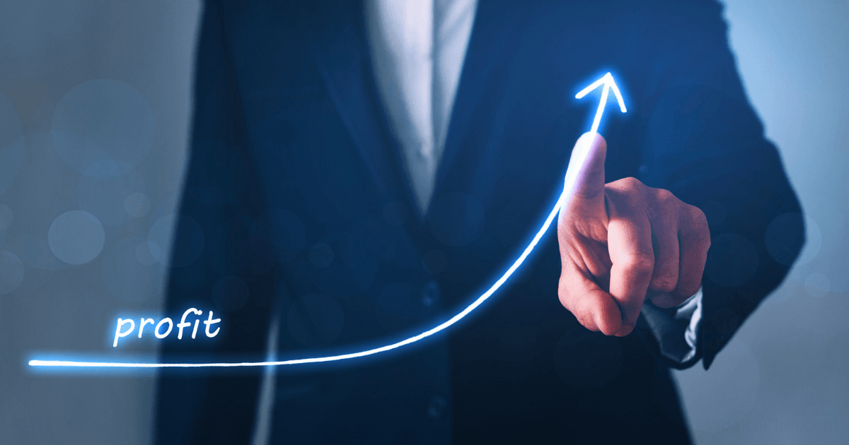 A person in a suit points at an upward-curving, glowing arrow labeled profit, symbolizing business growth and the financial success achieved through Profit First implementation.